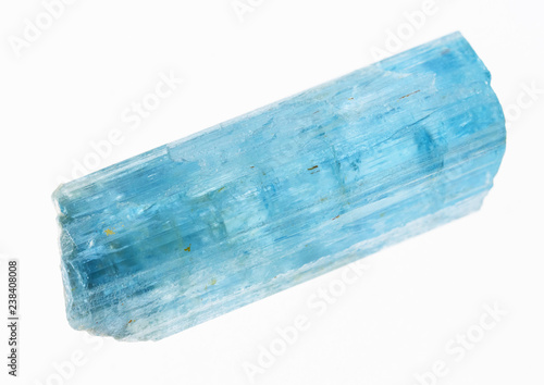 raw aquamarine (blue beryl) crystal on white