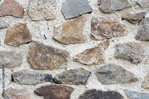 Uniform texture of large sandstone fragments.