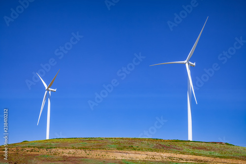 wind turbines on hill top