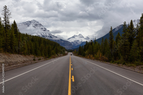 Beautiful view of a scenic road in the Canadian Rockies during Fall Season. Taken in Icefields Pkwy, Jasper, Alberta, Canada. © edb3_16