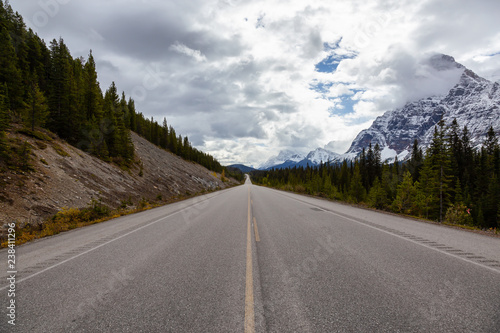 Beautiful road in the Canadian Rockies during Fall Season. Taken in Icefields Pkwy, Banff, Alberta, Canada. © edb3_16