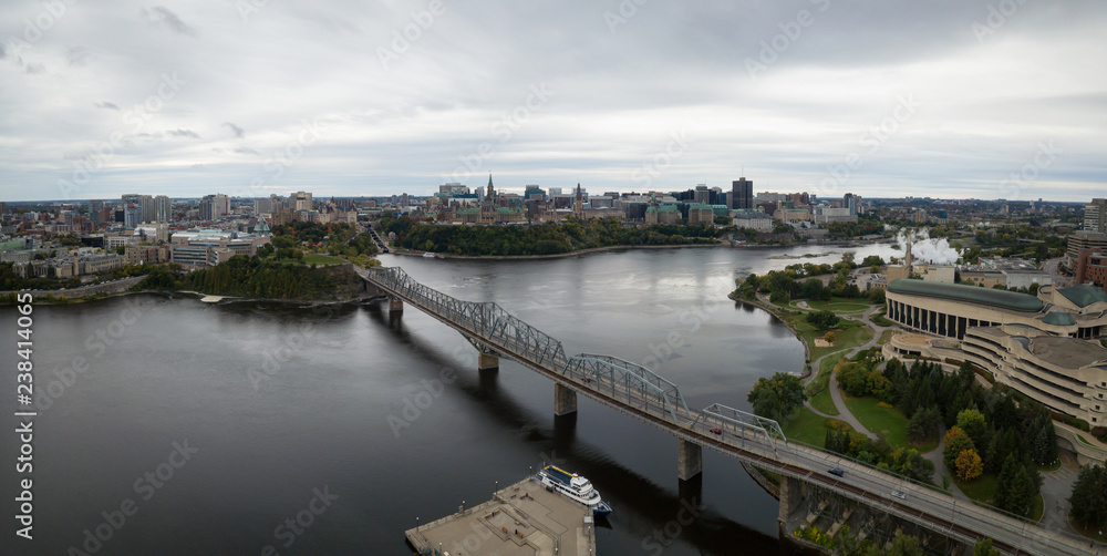 Aerial panoramic view of Alexandra Bridge going over Ottawa River from Quebec to Ontario. Taken in Hull, Gatineau, Quebec, Canada.