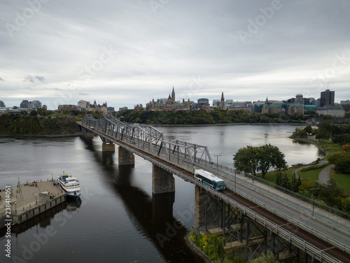 Aerial panoramic view of Alexandra Bridge going over Ottawa River from Quebec to Ontario. Taken in Hull, Gatineau, Quebec, Canada.