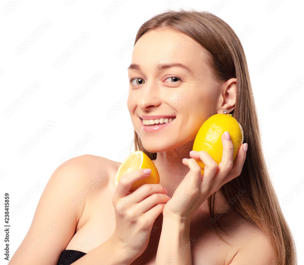 Beautiful woman with lemon beauty fashion skin freshness face on a white background. Isolation Beautiful woman with lemon beauty fashion skin freshness face on a white background. Isolation
