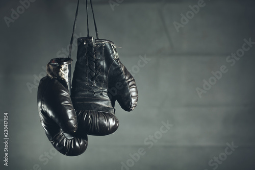 boxing gloves on a dark background © ARAMYAN