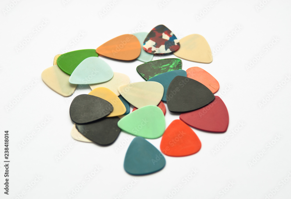 multicolor guitar picks on white multicolor guitar picks on white