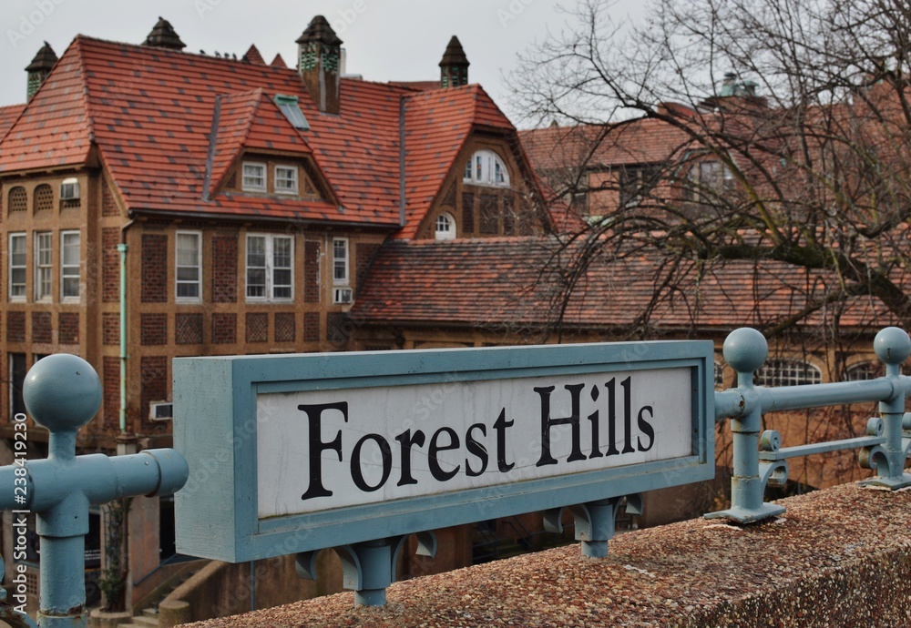 Fototapeta premium Forest Hills Queens New York Sign Old Tudor Style Building Background