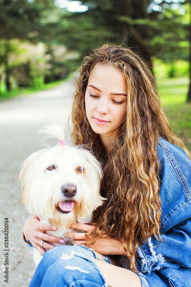Portrait of a beautiful woman with dog. Portrait of a beautiful woman with dog.