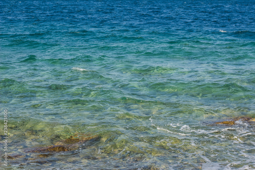 vivid transparent blue sea water with waves background surface, Mediterranean landscape in summer weather timebeach,coast,landscape,ambiance,background,storm,sea shore,blue water,sea water,water surfa vivid transparent blue sea water with waves background surface, Mediterranean landscape in summer weather timebeach,coast,landscape,ambiance,background,storm,sea shore,blue water,sea water,water surfa