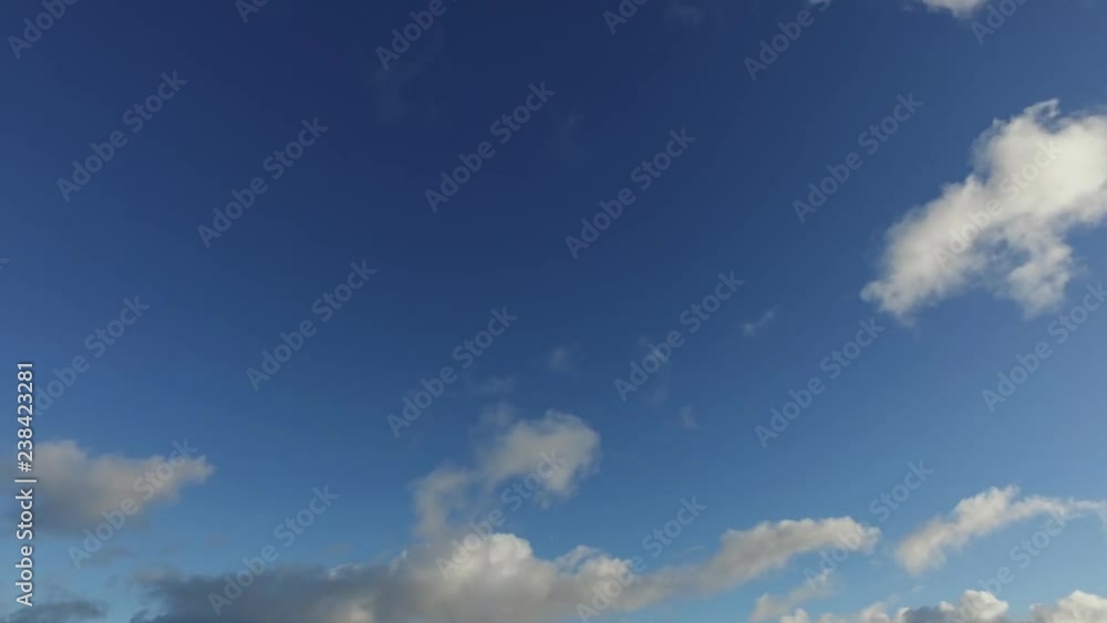 White clouds on a blue sky, time lapse White clouds on a blue sky, time lapse