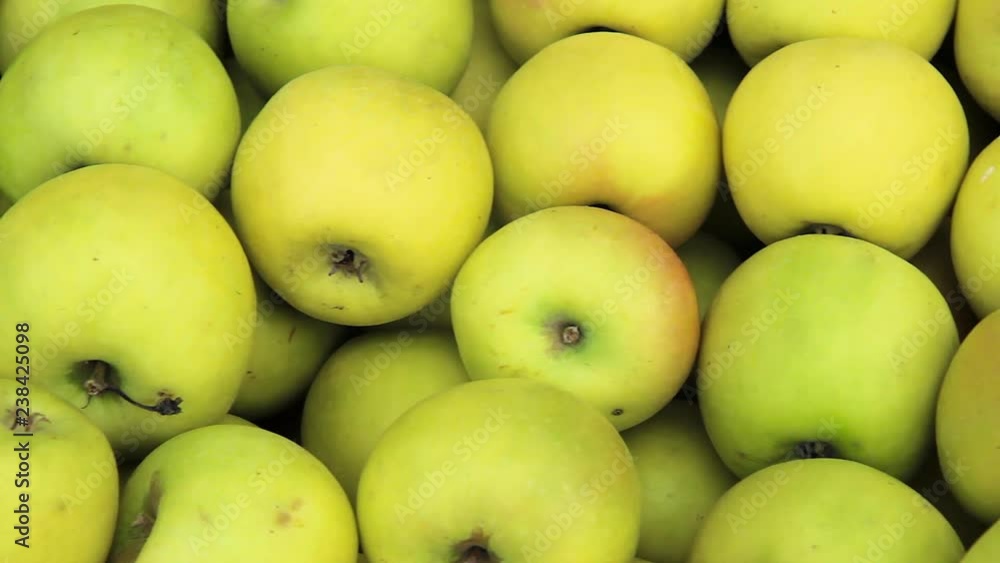 background of green apples on sale at the local market background of green apples on sale at the local market
