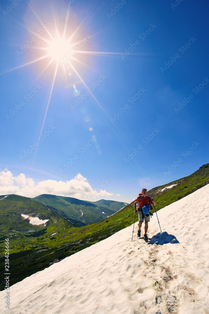 Obraz premium Long trip to the top of the mountain in the summer.