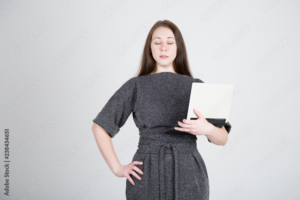 young girl with laptop closing her eyes young girl with laptop closing her eyes