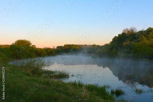Fototapeta Naklejka Na Ścianę i Meble -  Misty morning over the river in the spring