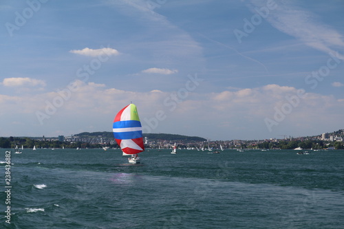 windsurfing over a lake in Zurich