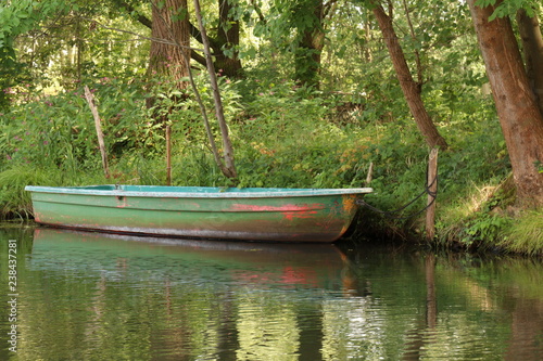 green boat on the lake