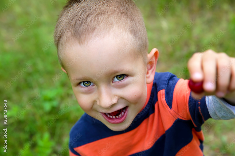 Cute smiling little boy outdoors Cute smiling little boy outdoors