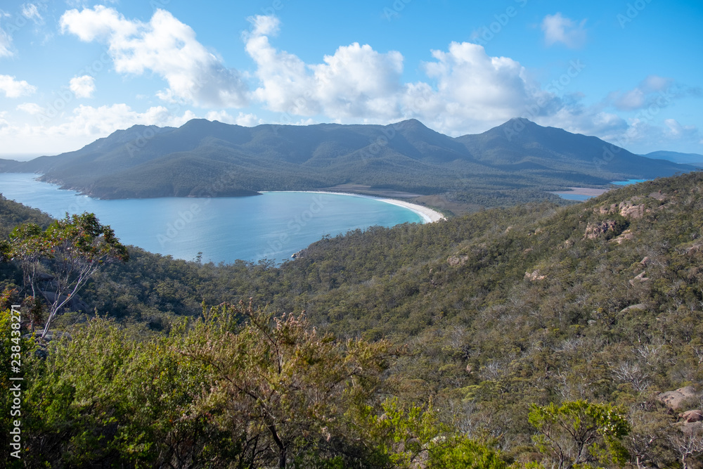 Wineglass Bay, Freycinet National Park, Tasmania, Australia on a cloudy day viewed from the lookout walk