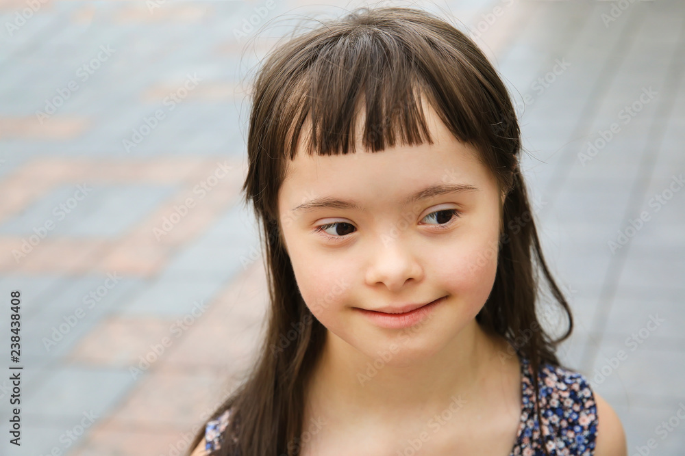 Portrait of little girl smiling in the city Portrait of little girl smiling in the city