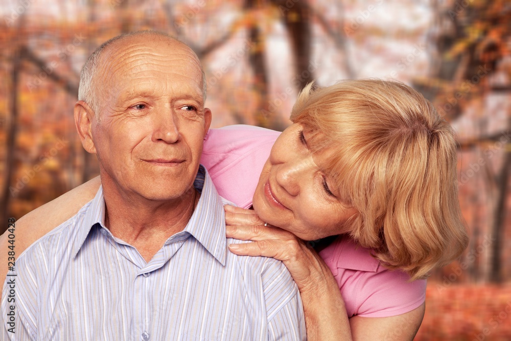 Portrait of happy senior couple smiling at home Portrait of happy senior couple smiling at home