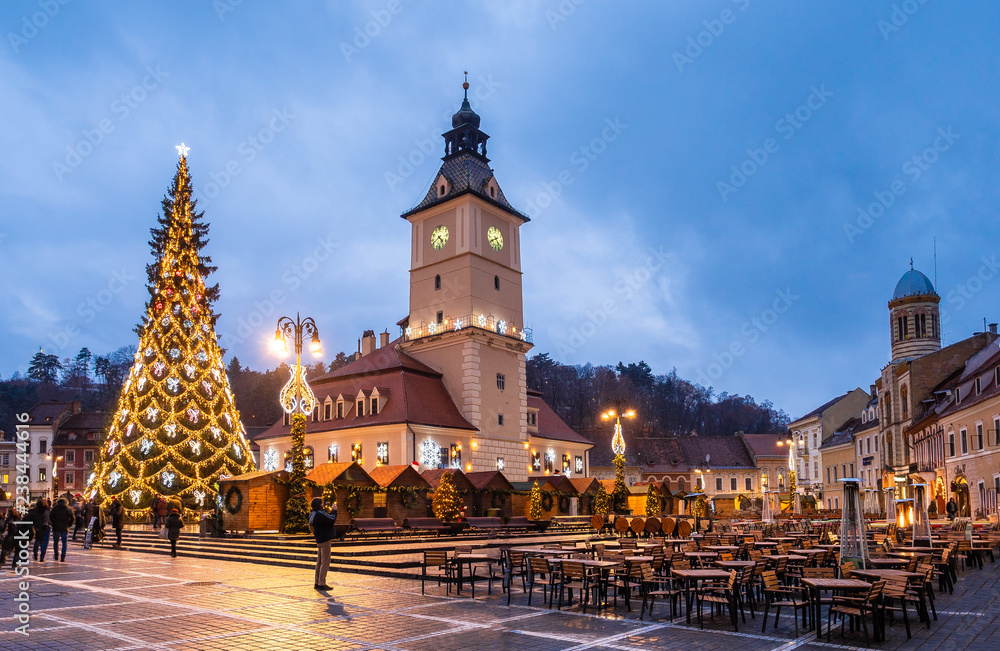 Christmas market and decorations tree in center of Brasov town, Transylvania, Romania