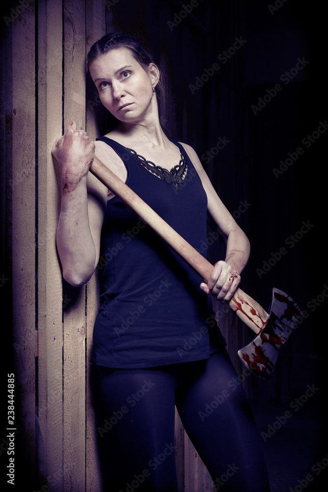 Fototapeta premium Vulnerable woman in underwear escaping from basement