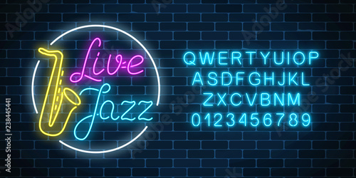 Neon jazz cafe with live music and saxophone glowing sign with alphabet. Glowing street signboard.