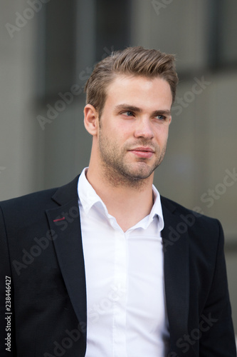 Businessman ready to solve pronlems. Man well groomed elegant formal suit walk urban background. Businessman handsome attractive office worker. Businessman serious quick walk during lunch time