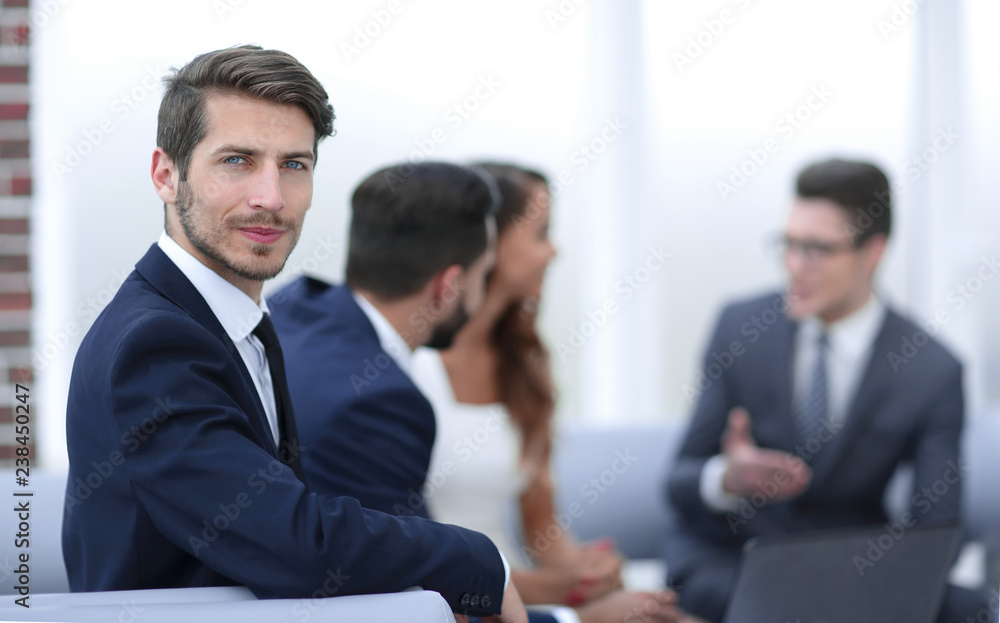 portrait of a successful businessman on the background of the office portrait of a successful businessman on the background of the office