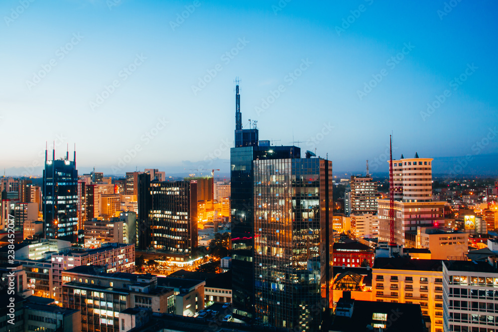 Fototapeta premium Buildings illuminated at sunset