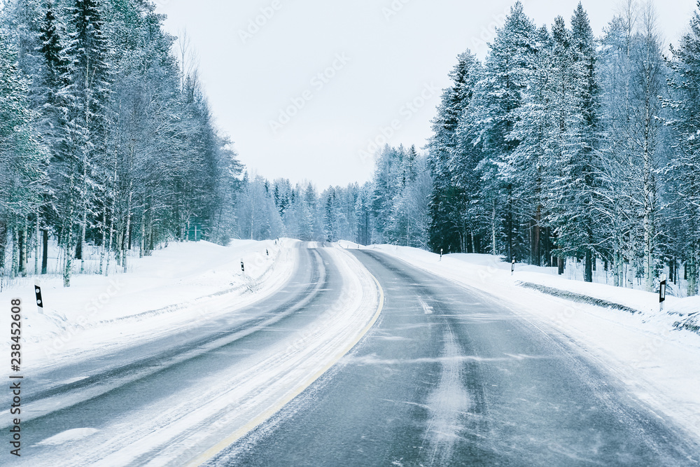 Road in snowy winter Lapland - obrazy, fototapety, plakaty 