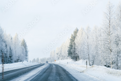 Winter road and Snowy Forest at Cold Finland © Roman Babakin