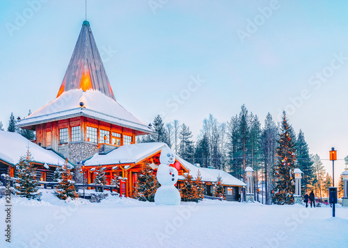 Snowman at Santa Office in Santa Claus Village in Rovaniemi, Lapland, Finland photo