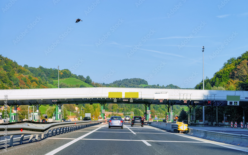 Cars at Toll booth with Blank signs road Slovenia