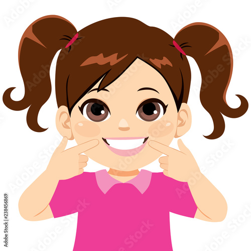 Young happy sweet little girl smiling showing her white smile pointing fingers at teeth