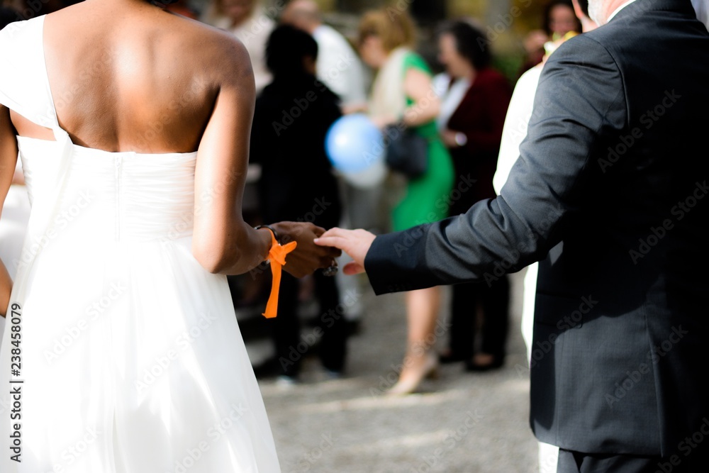 bride and groom holding their hands bride and groom holding their hands