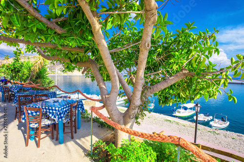 Fototapeta Naklejka Na Ścianę i Meble -  Typical Greece restaurant on the beach, Creta, Greece, Europe.