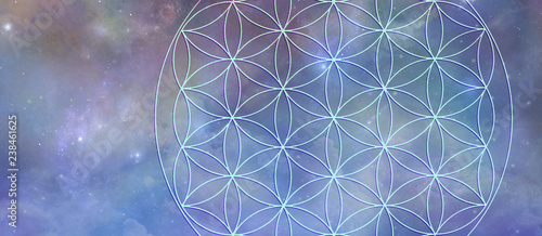 Celestial Flower of Life Background Banner - Cosmic blue outer space background with a partial flower of life symbol superimposed over the top 
