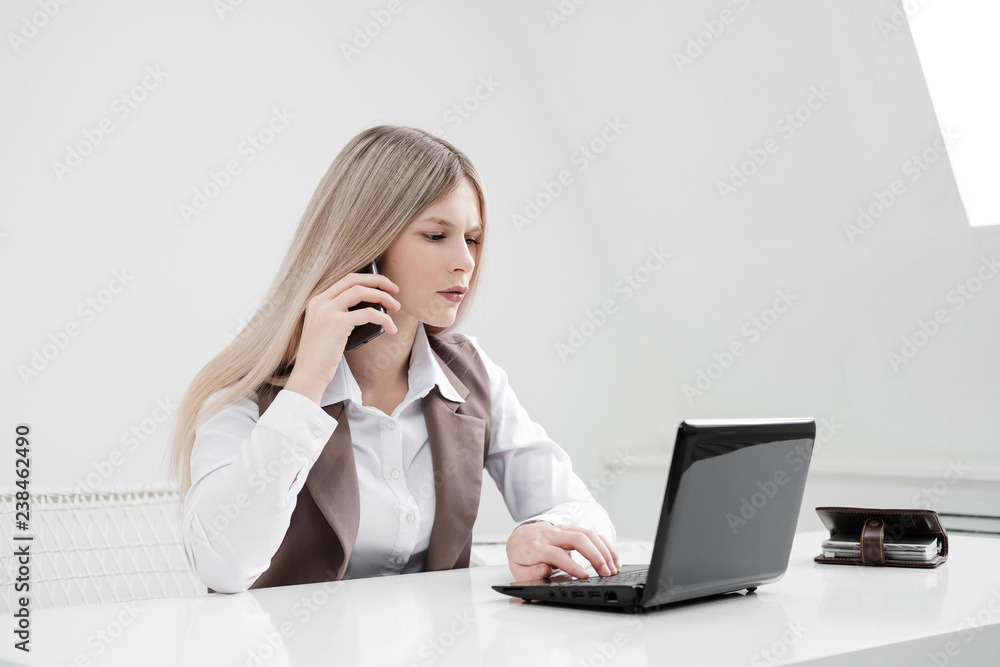 The girl office worker is annoyed. Shouts on the phone and outraged. The girl office worker is annoyed. Shouts on the phone and outraged.