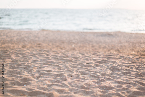 Fototapeta Naklejka Na Ścianę i Meble -  Background of a secluded sandy beach in pastel shades.