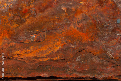 Rusty iron sheet. Fatal oxidation of metal. A dead ship destroyed by the sea.