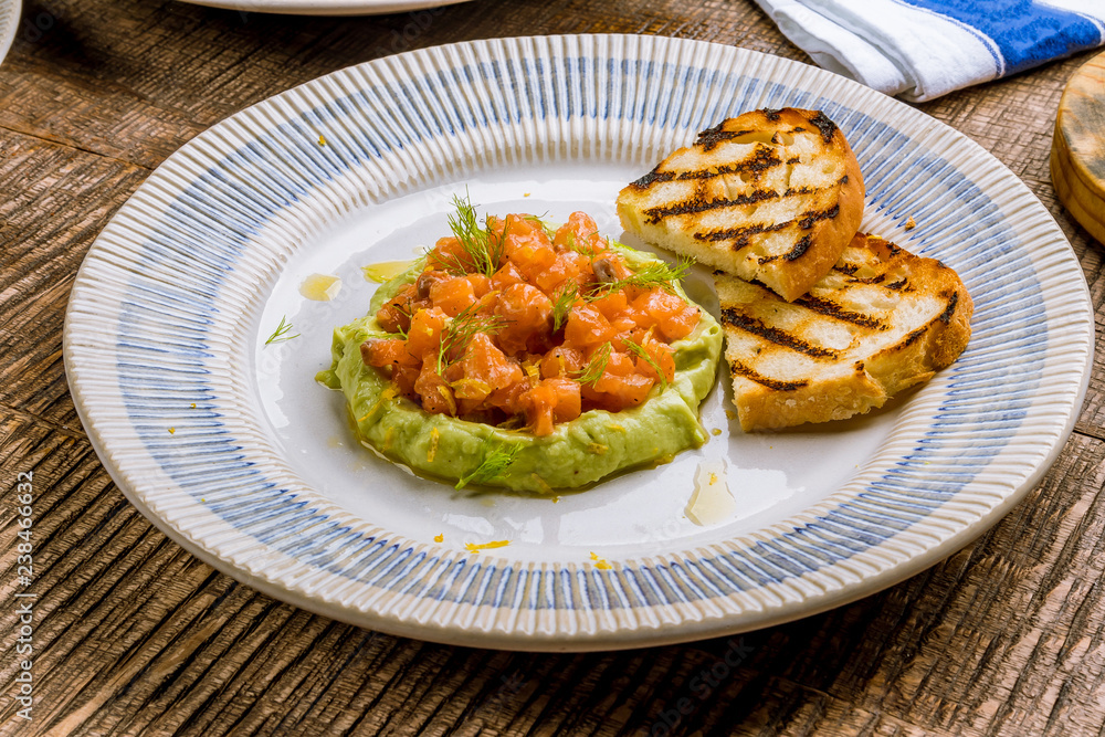 salmon Tartar on a plate salmon Tartar on a plate