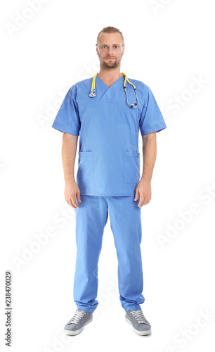 Full length portrait of medical assistant with stethoscope on white background