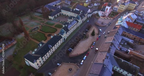 Camera flight over The Manetin town. It is baroque landmark in Western Bohemia. Amazing destination in Central Europe. photo