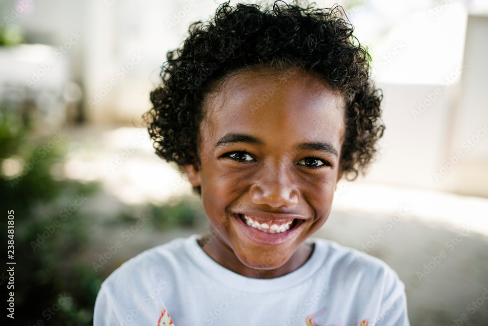 Portrait of smiling boy standing in park Portrait of smiling boy standing in park