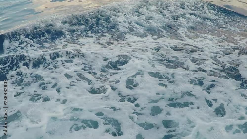 Sea waves in water filmed from above ferry
Sea waves in water filmed from above ferry