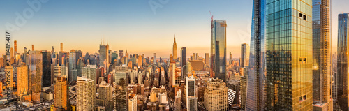 Aerial panorama of New York skyline above Hudson Yards midtown Manhattan skyscrapers on a sunny afternoon