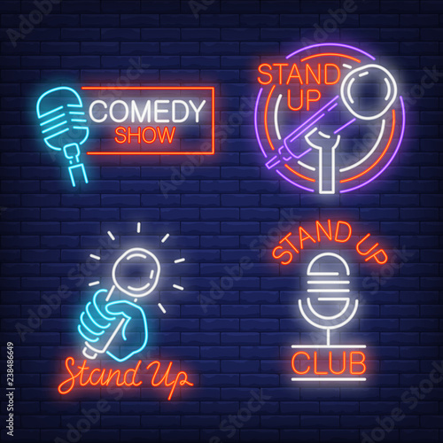 Stand up show neon signs set with microphones. Concert and entertainment design elements. Night bright neon sign, colorful billboard, light banner. Vector illustration in neon style.