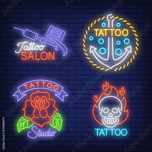 Tattoo machine, anchor, rose and skull neon signs set with text. Tattoo salon advertisement design. Night bright neon sign, colorful billboard, light banner. Vector illustration in neon style.