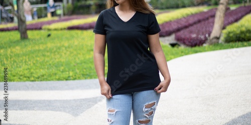 Young woman wearing black t-shirt v-neck, ready for your mockup template